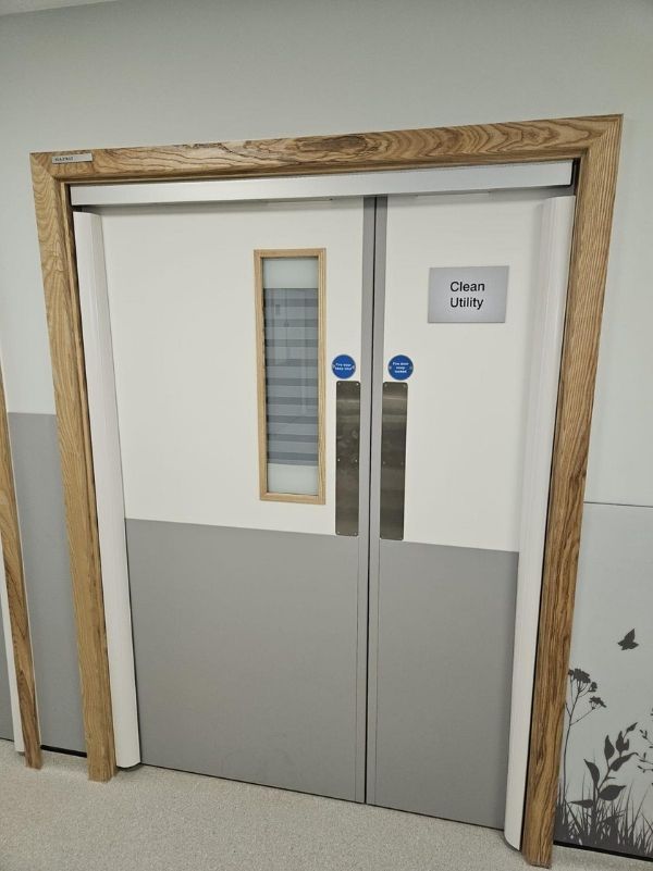 Fire door installation work in progress on site